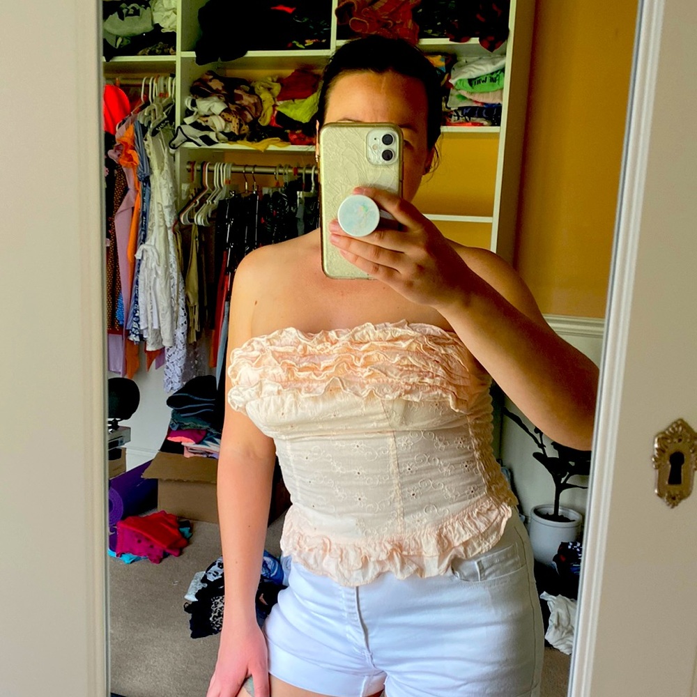 Stretchy, ruffle top with bow in the back